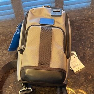 Tumi Men's Black and Tan Belt Bag- new with tags!